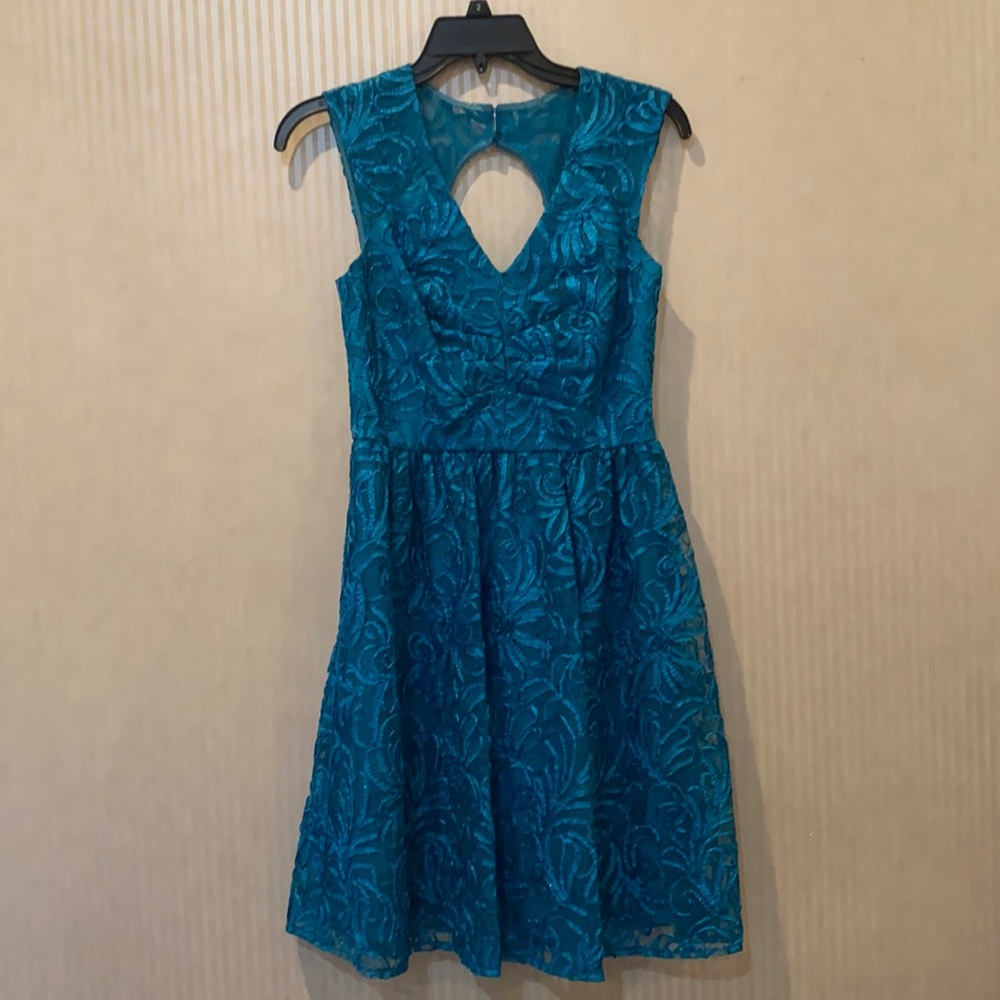 Never worn fully laced teal dress